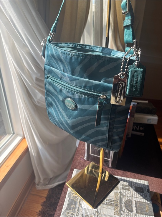 Coach Handbags - NWT* Coach Getaway Zebra Print Nylon Crossbody Bag Mineral Teal